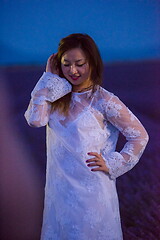 Image showing portrait of and asian woman in lavender flower field