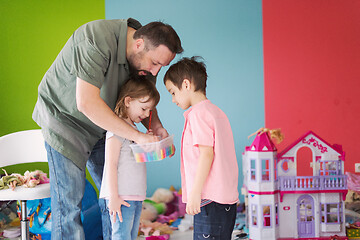 Image showing sister and brother havin fun and play hairstylist game at home