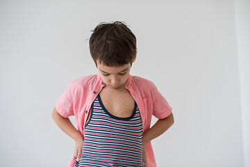 Image showing lilittle boy looking at heart love symbol sketched on his chest