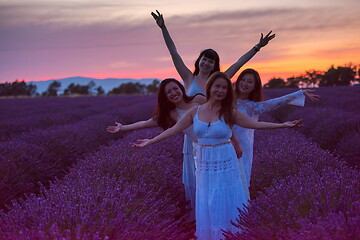 Image showing group of famales have fun in lavender flower field