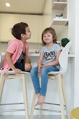 Image showing cute little brother and sister at home