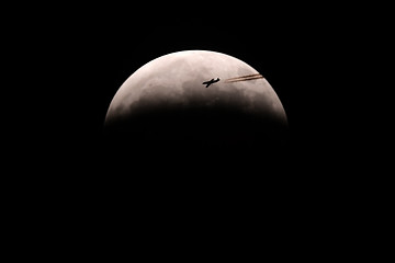 Image showing Moon with Airplane