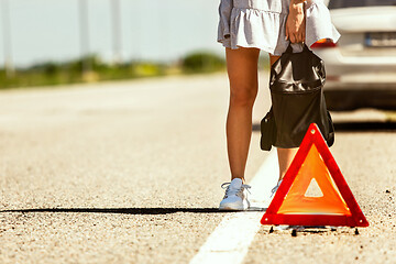 Image showing Young couple traveling on the car in sunny day