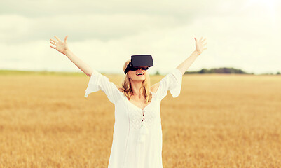 Image showing woman in virtual reality headset on cereal field