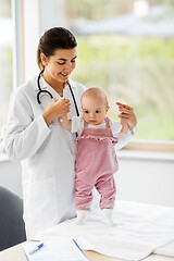 Image showing female pediatrician doctor with baby at clinic