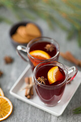 Image showing mulled wine, orange slices, gingerbread and spices