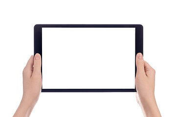 Image showing Hands holding black tablet, isolated on white background