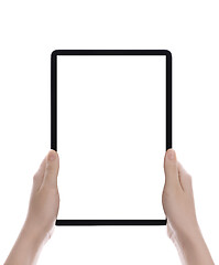 Image showing Hands holding black tablet, isolated on white background