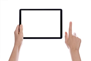 Image showing Hands holding black tablet, isolated on white background