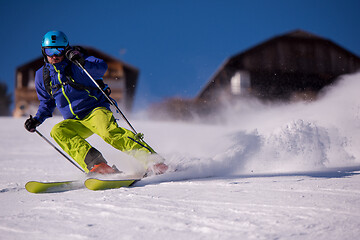 Image showing Skier having fun while running downhill