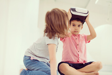 Image showing kids using virtual reality headsets at home