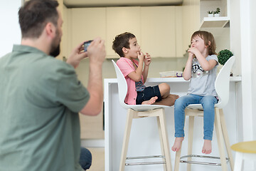 Image showing cute little brother and sister at home