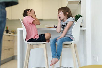 Image showing cute little brother and sister at home