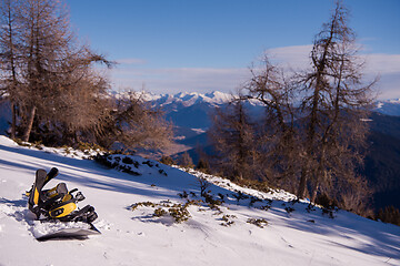 Image showing snowboard in snow