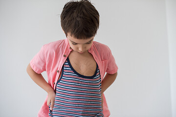 Image showing lilittle boy looking at heart love symbol sketched on his chest