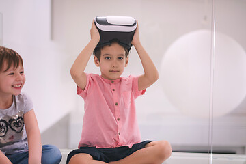 Image showing kids using virtual reality headsets at home