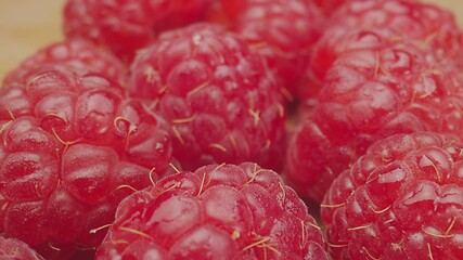 Image showing Red raspberries in camera motion