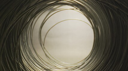 Image showing Camera motion in round steel wired tunnel