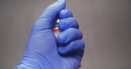 Image showing Vaccine in human hands closeup footage