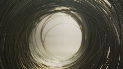 Image showing Camera motion in round steel wired tunnel