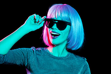 Image showing happy woman in pink wig and black sunglasses