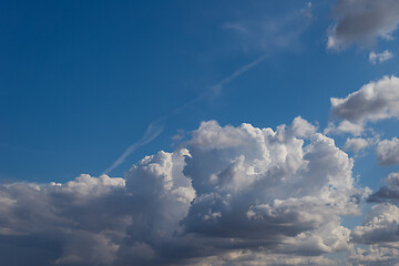 Image showing Fluffy clouds in blue sky