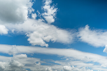 Image showing Fluffy clouds in blue sky