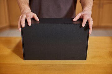 Image showing Hardware shop counter seller shoing box