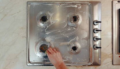 Image showing Dirty stove in a kitchen