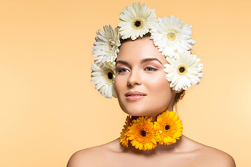 Image showing beautiful girl with white and yellow flowers