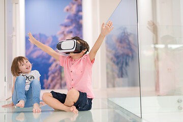 Image showing kids using virtual reality headsets at home