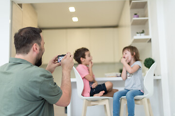 Image showing cute little brother and sister at home