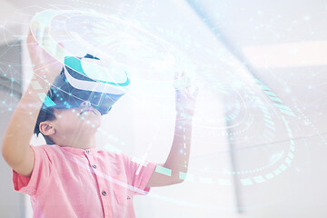 Image showing kid at home playing games on  vr glasses