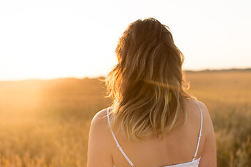 Image showing woman on cereal field in summer