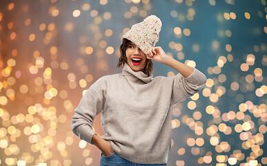 Image showing young woman in knitted winter hat and sweater