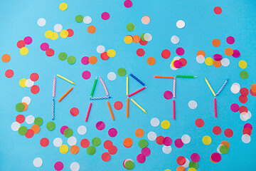 Image showing word party made of birthday candles on blue