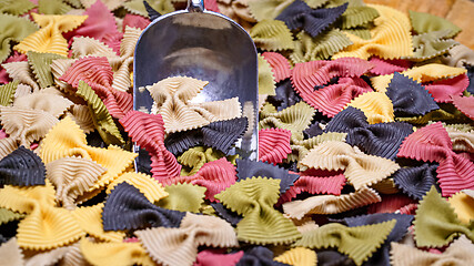 Image showing Colored Farfalle Pasta bow tie pasta background.