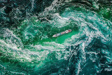 Image showing Storm waves of the sea around the ship.