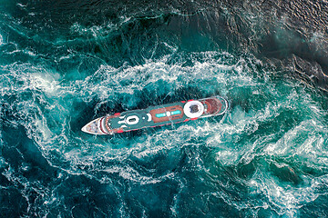 Image showing Storm waves of the sea around the ship.