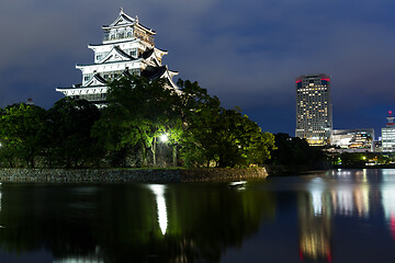 Image showing Hiroshima castle on the side of Otagawa river 