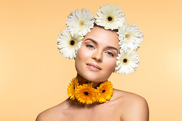 Image showing beautiful girl with white and yellow flowers