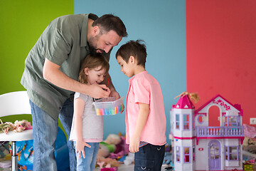 Image showing sister and brother havin fun and play hairstylist game at home