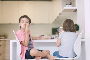 Image showing cute little brother and sister at home