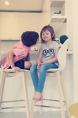 Image showing cute little brother and sister at home