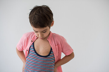 Image showing lilittle boy looking at heart love symbol sketched on his chest