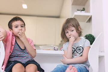 Image showing cute little brother and sister at home