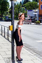 Image showing laughing, elegant woman with red hair