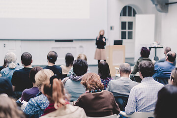 Image showing Female speaker giving presentation on business conference.