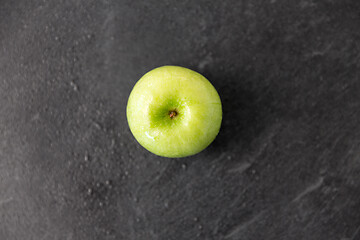 Image showing ripe green apple on slate stone background