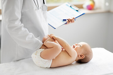 Image showing female pediatrician doctor with baby at clinic